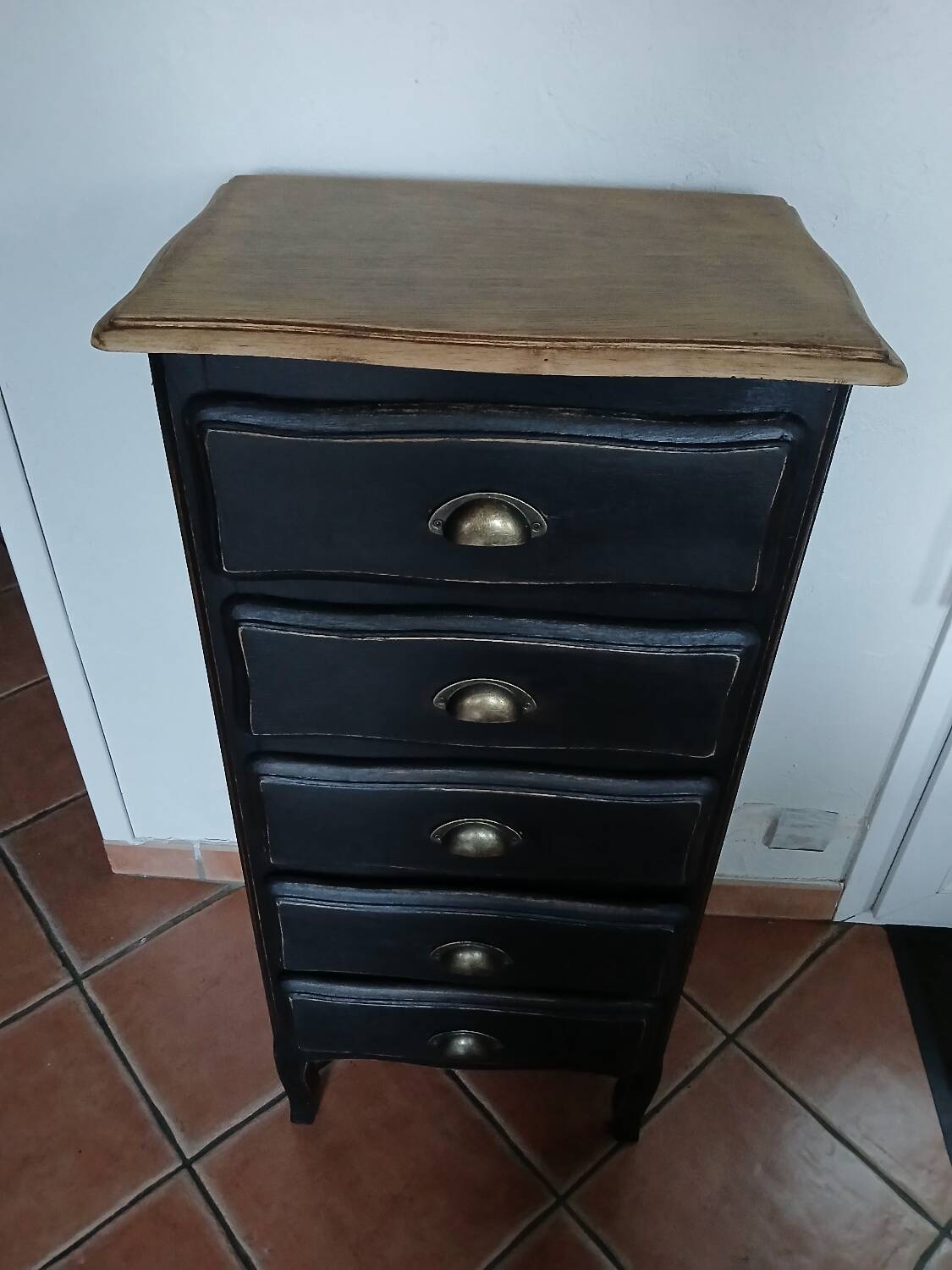 Black painted wooden chest of drawers