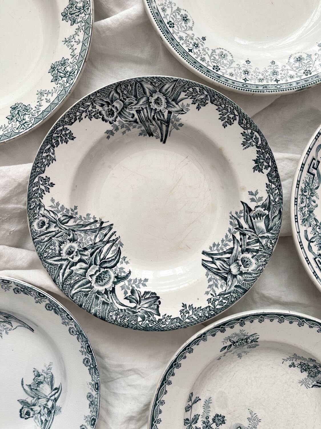6 mismatched Saint Amand ironstone soup plates