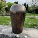 Art Deco vase in brass with geometric patterns