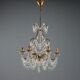 Antique chandelier in gilded iron and metal, Italy, 20th century