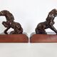 Pair of vintage leather & ceramic bookends