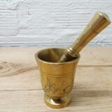 Golden brass mortar and pestle