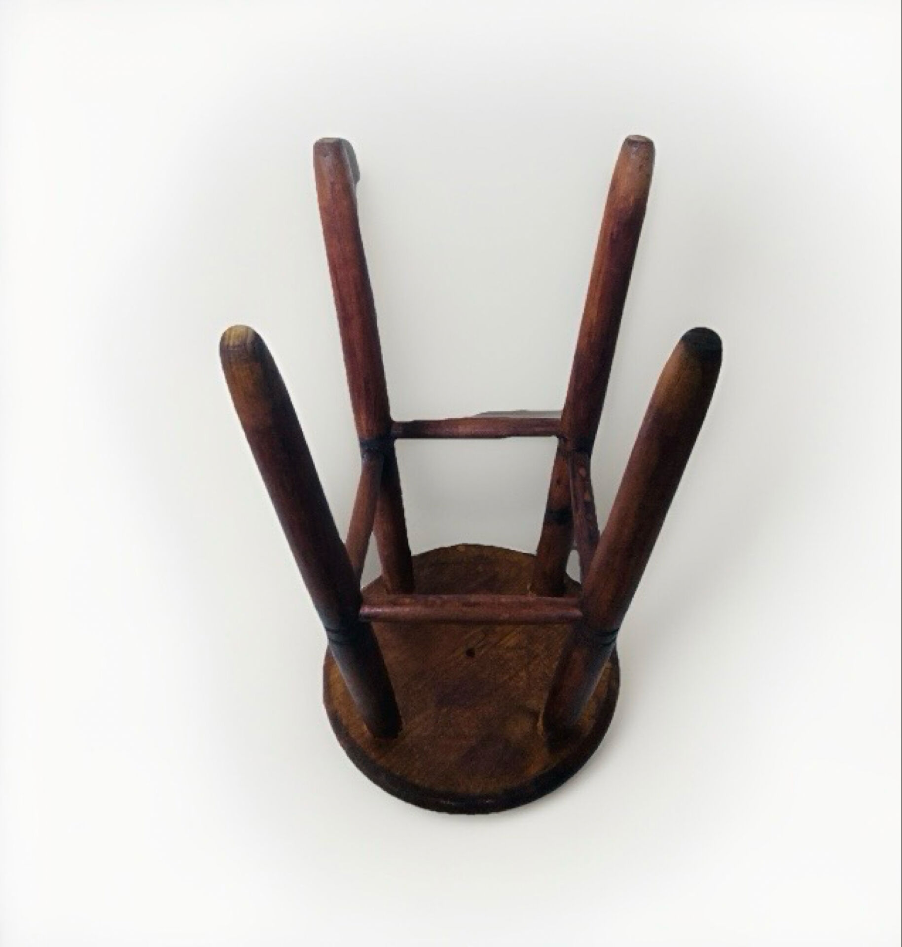 Vintage four-legged stool made of solid wood from the 1970s/80s.