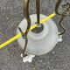 Antique brass chandelier with 3 lights and frosted glass shades.