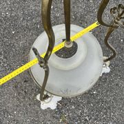 Antique brass chandelier with 3 lights and frosted glass shades.