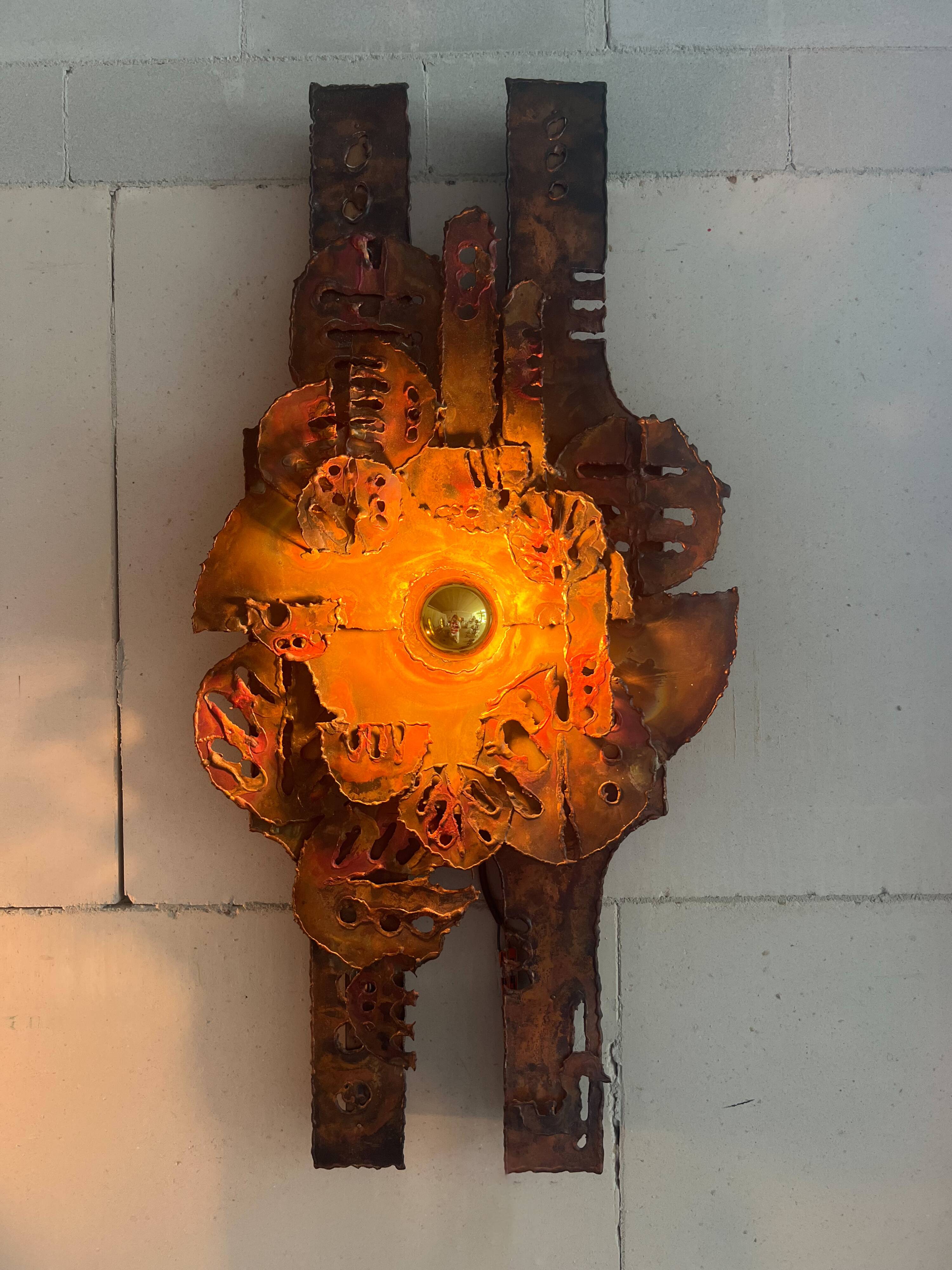 Raw expressive wall sconces by Francesco Pasinato