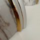 Pair of vintage marbled and gilded porcelain sconces, France 1970