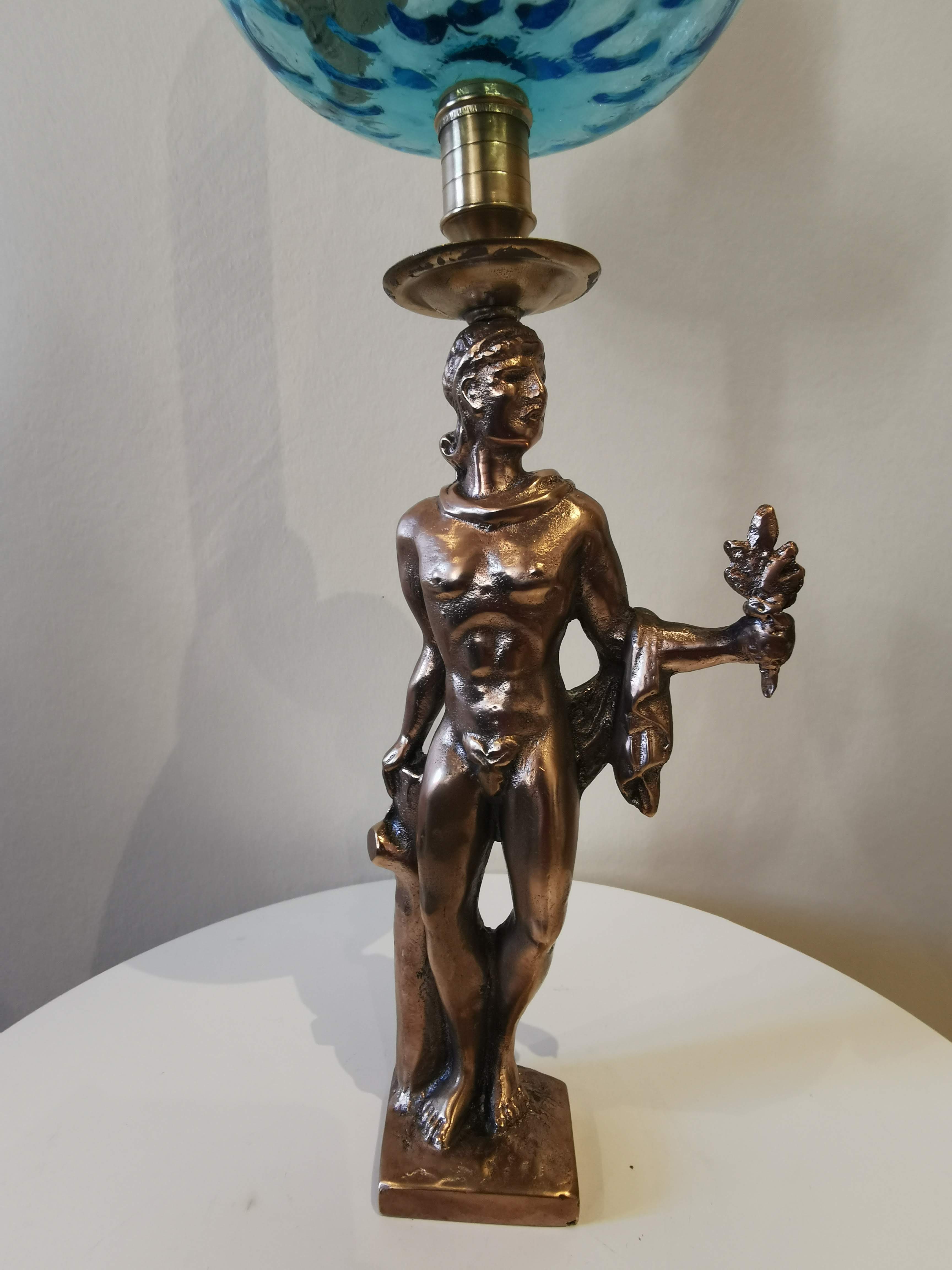 Large kerosene lamp mounted on bronze statue. Late nineteenth century