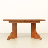 Large extendable Danish dining table in solid pine, 1970s.