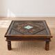 Large square vintage coffee table in wood, glass, and metal decor.