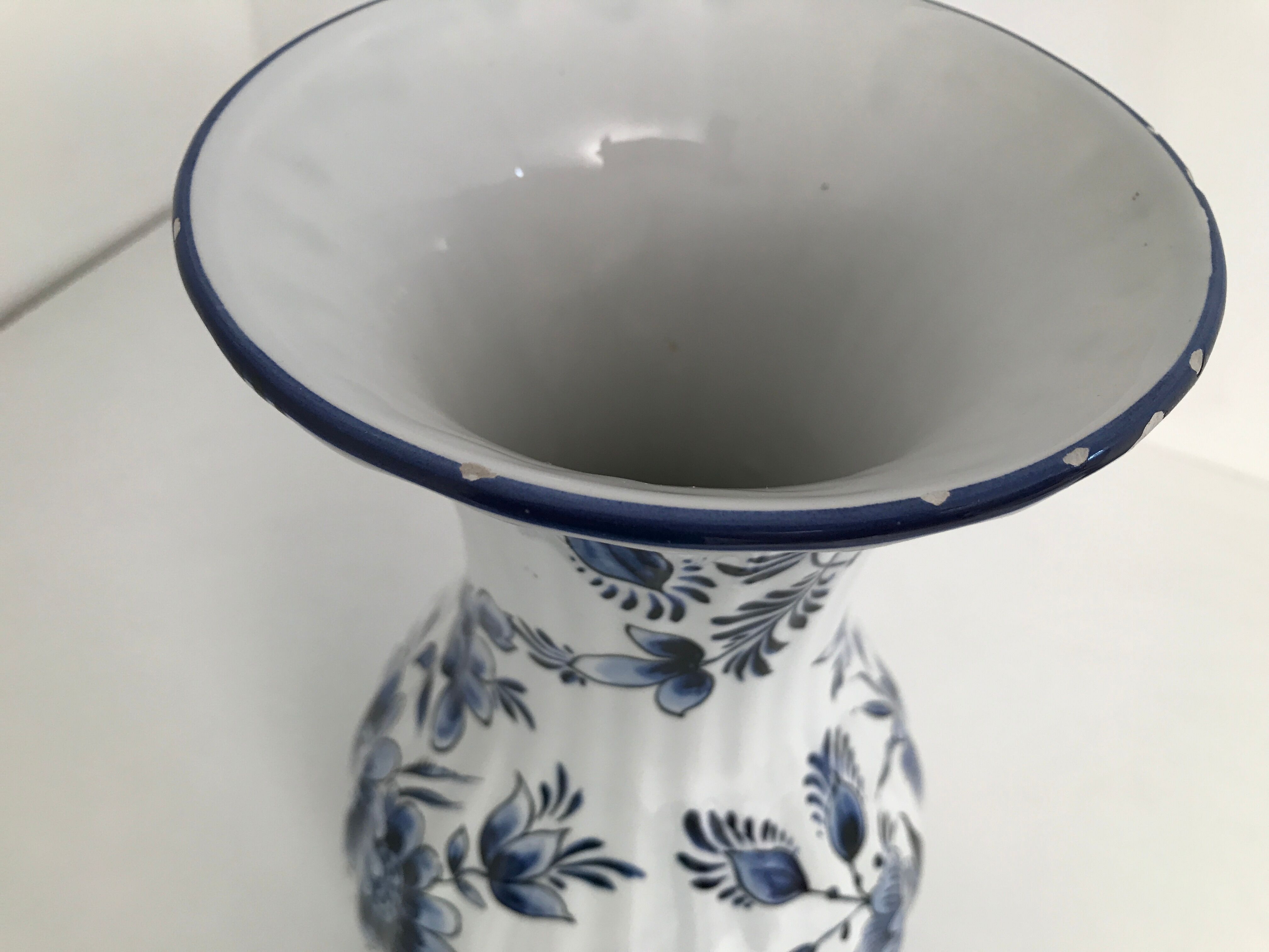 Vase with vintage blue and white flower pattern signed