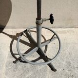Adjustable and rotating industrial stool