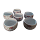 Service of small six cups for tea, cream, fruit salad or coffee
