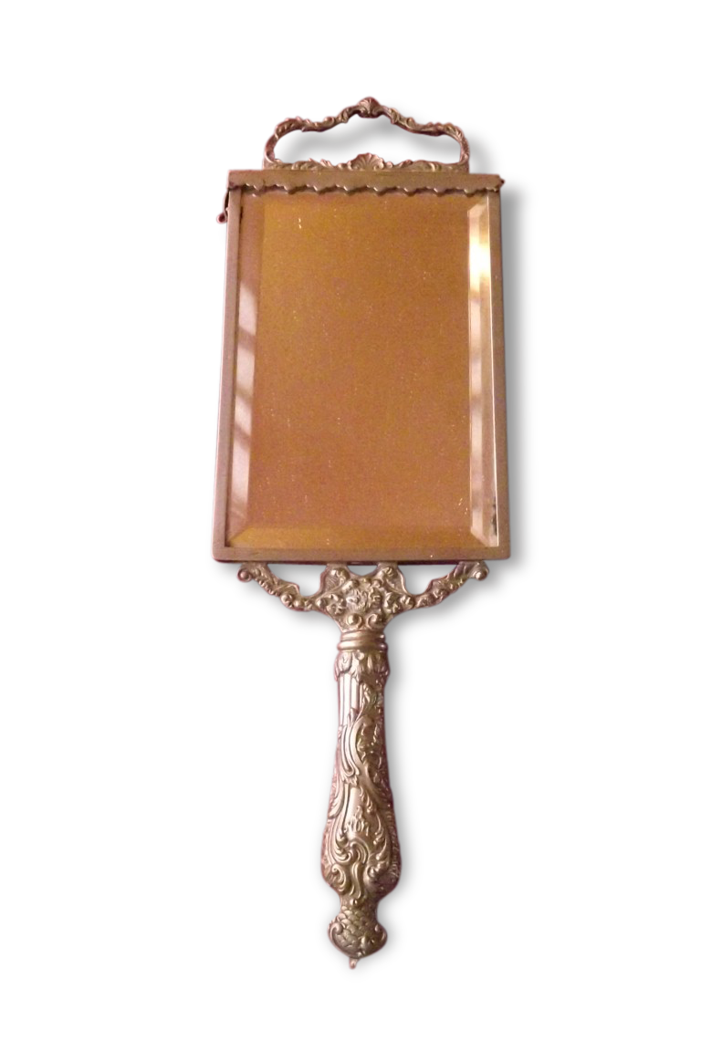 Mirror opposite hand 1900 silver metal