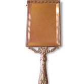 Mirror opposite hand 1900 silver metal