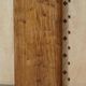 Pair of tall walnut chests of drawers with curved fronts in country style.