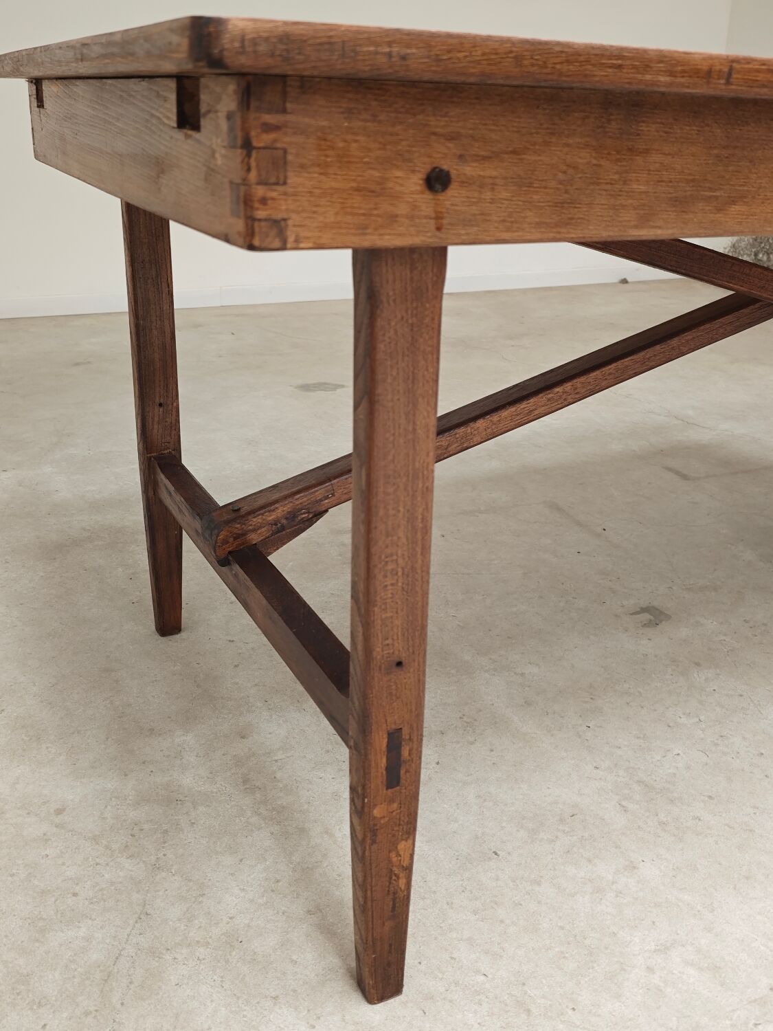 Vintage workshop folding table in oak with a hand-patinated black top.