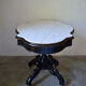Table violon Napoléon III en bois noirci et marbre blanc, XIXe siècle