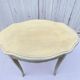 Eggshell-coloured drawer with a cracked effect side table.
