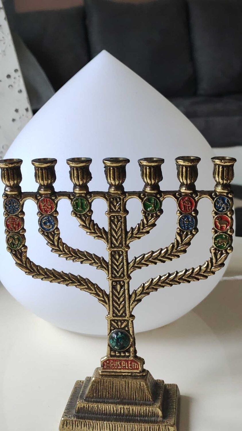Menorah/Hebrew Candlestick with 7 branches. Astrological signs. Hanukkah. In patinated brass old gold