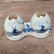 Salt and pepper shaker in Delftware pottery.