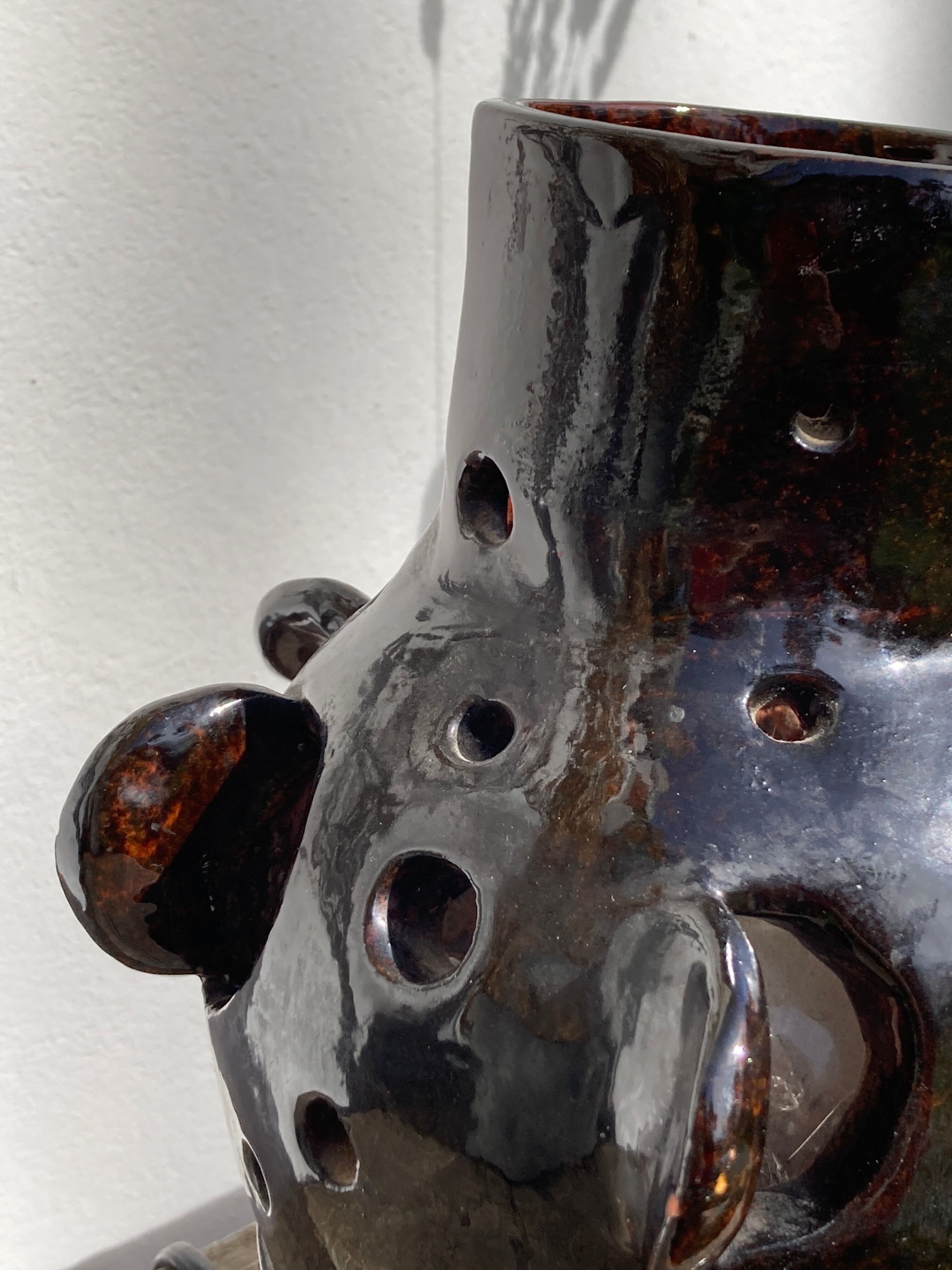 Brutalist lamp in black / brown ceramic openwork 1970