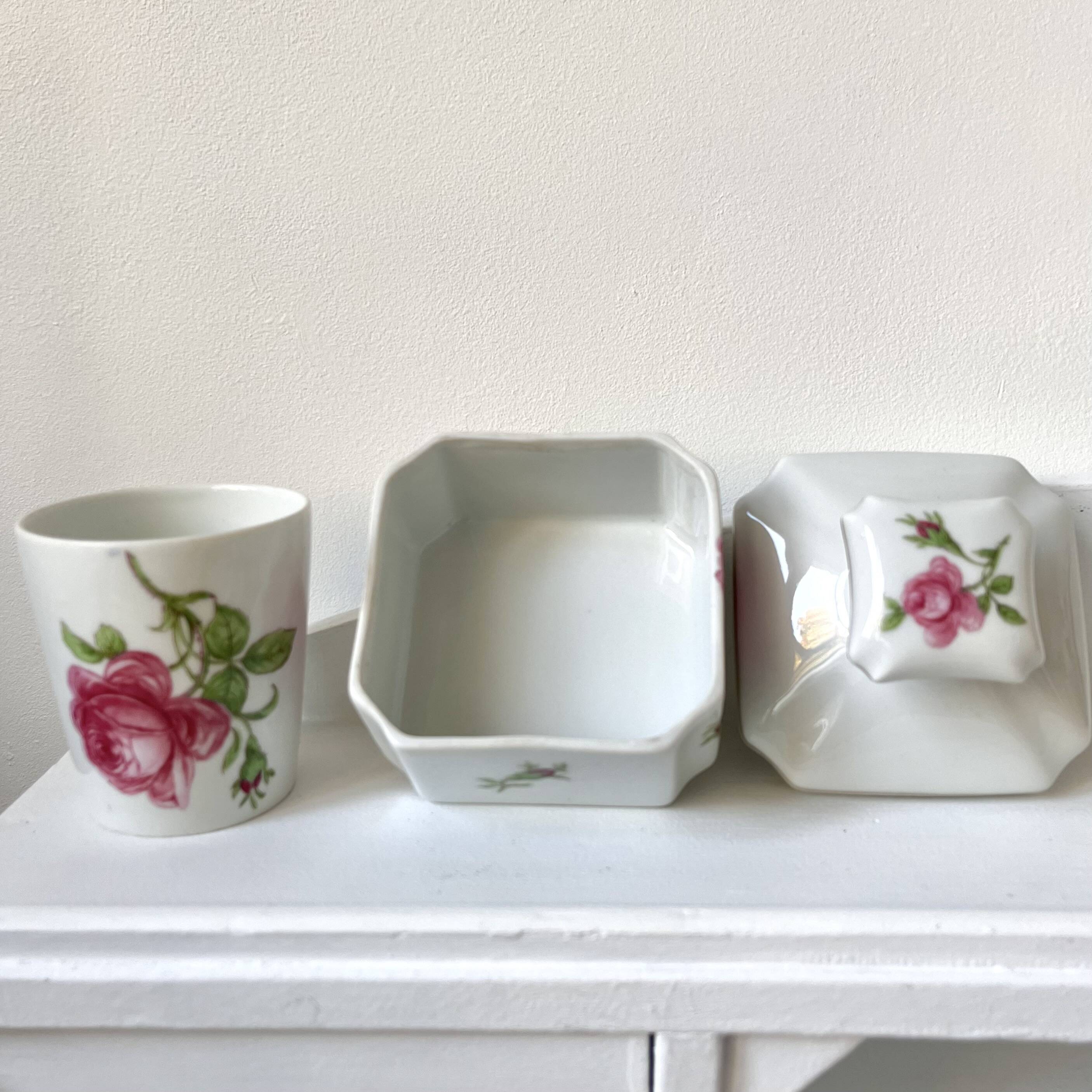 Limoges porcelain toiletry bottles decorated with roses