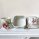 Limoges porcelain toiletry bottles decorated with roses