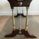 Neoclassical coffee table in wood, brass and leather