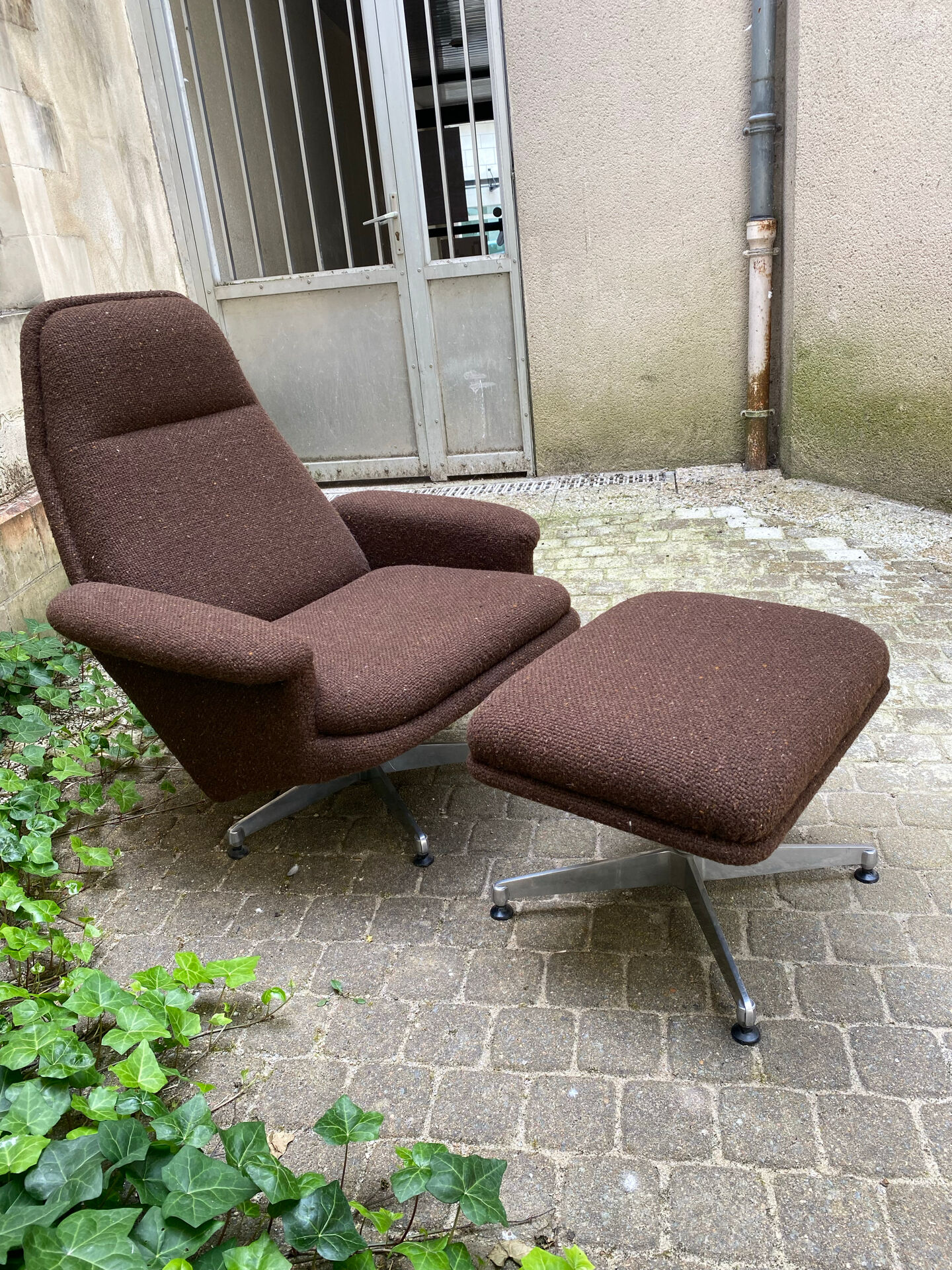 Fauteuil lounge et son ottoman de 1950