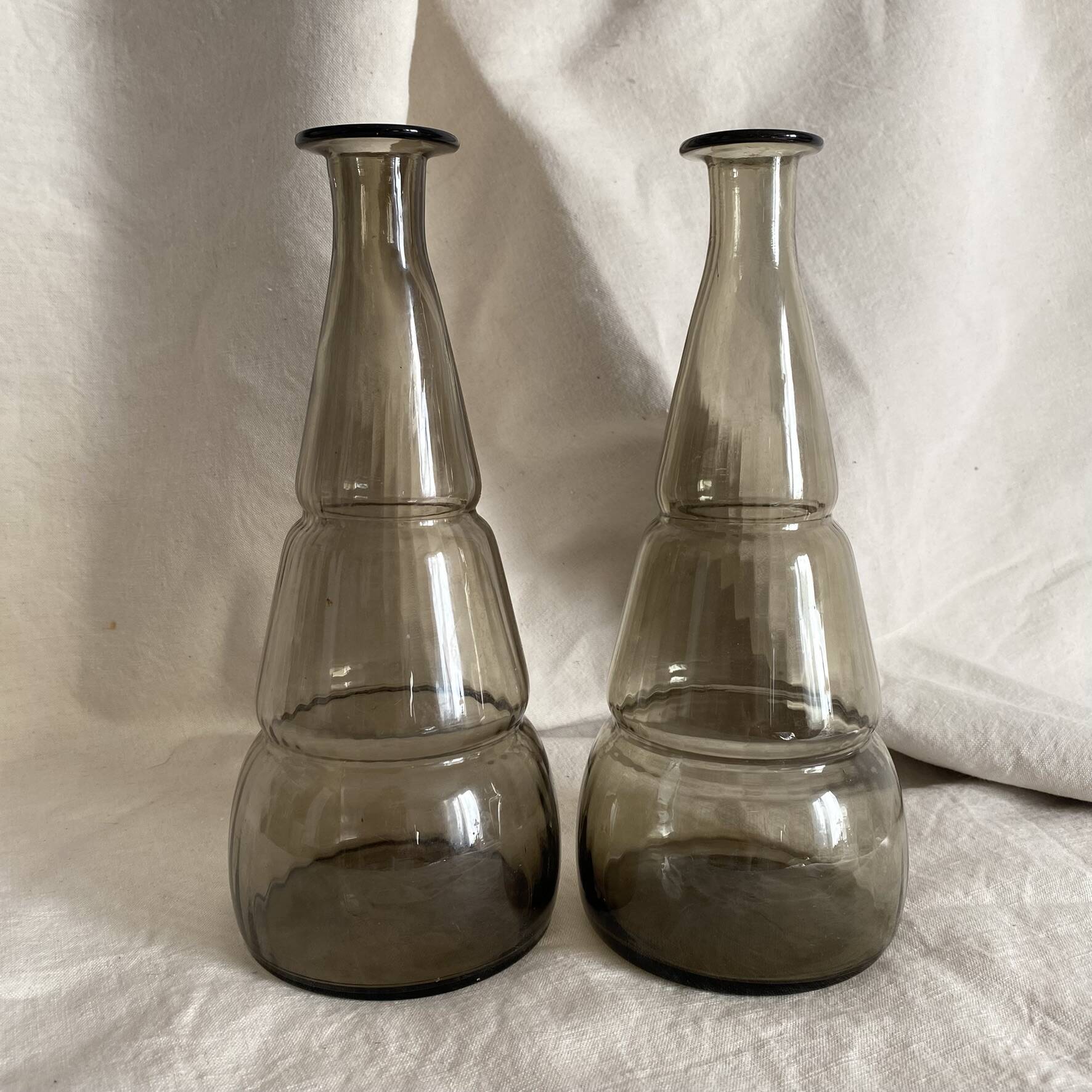 Pair of antique smoked glass vases carafes
