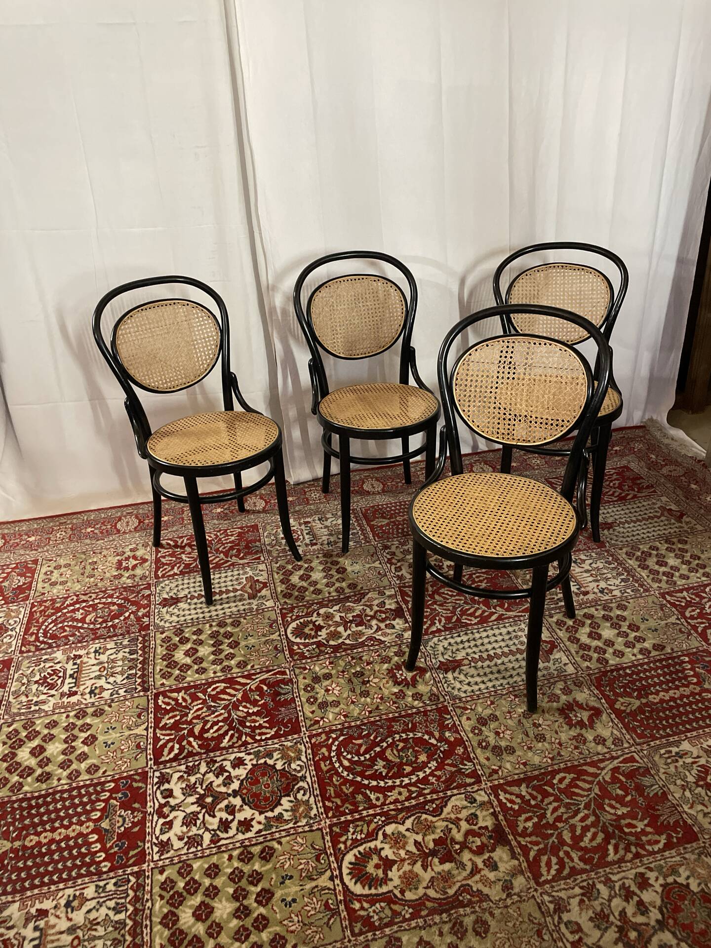 Set of 4 bentwood bistro chairs in black with caning.