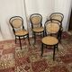 Set of 4 bentwood bistro chairs in black with caning.