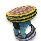 Zoomorphic beaded coffee table stool