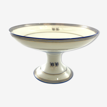 Cup on white stand monogrammed in faience