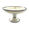 Cup on white stand monogrammed in faience