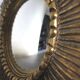 Golden sunburst convex vintage mirror from the 1960s.