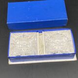 Salt shakers in their original box and teaspoon
