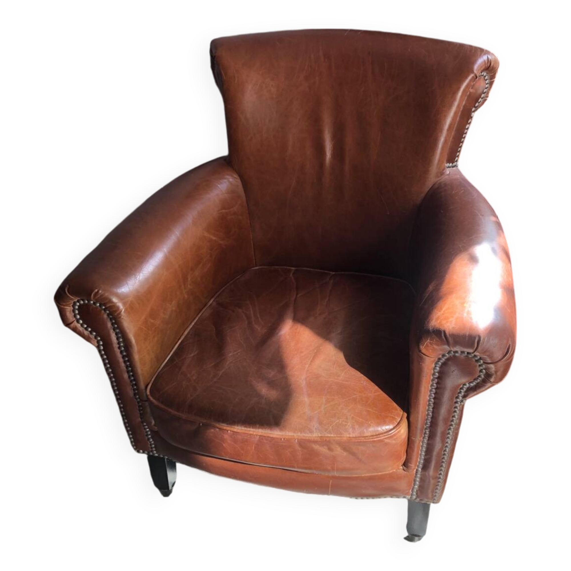 Industrial style aged leather armchair