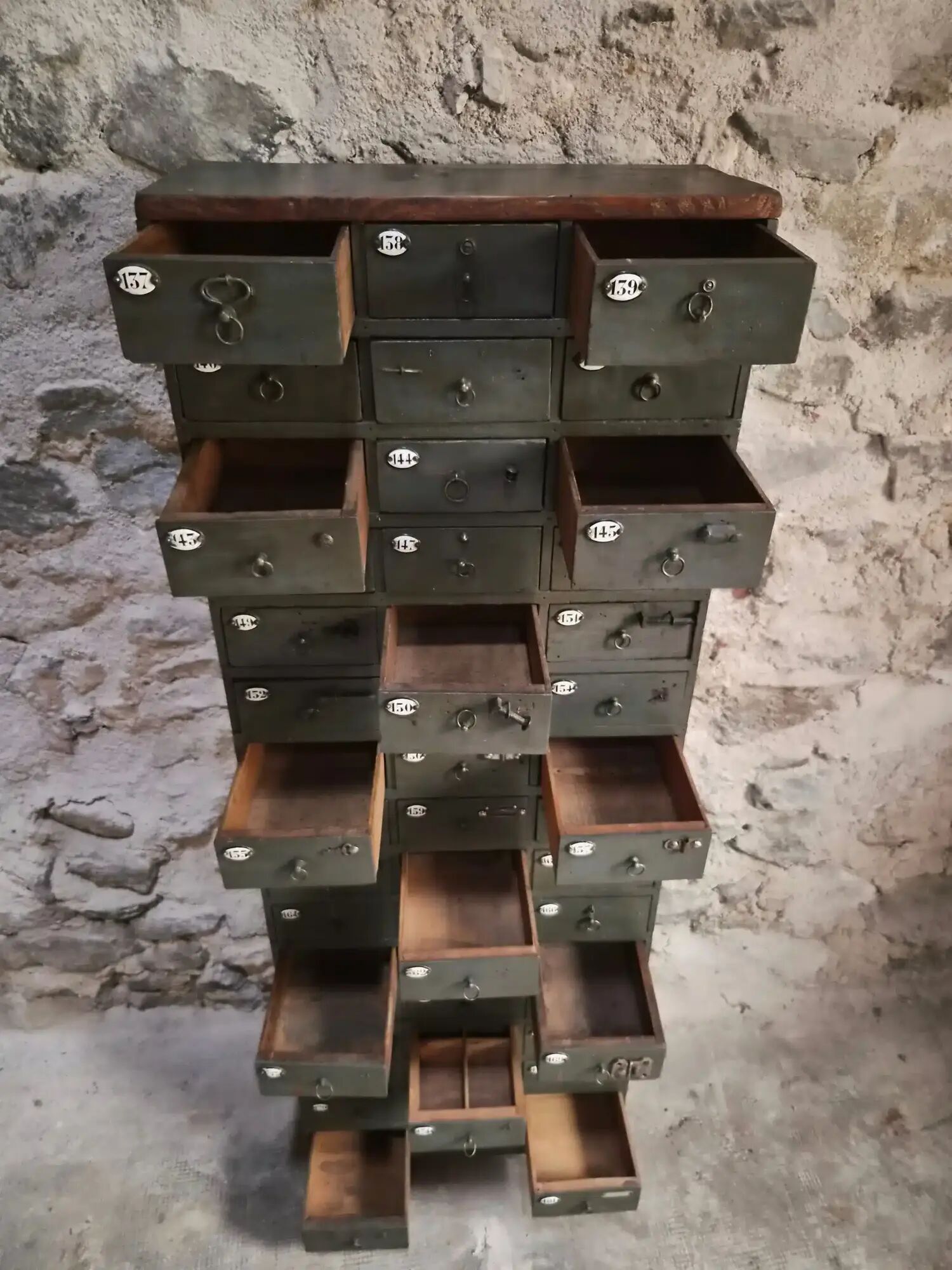 Antique hardware cabinet with 48 drawers, circa 1900.