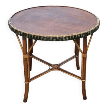 Round wood and rattan table
