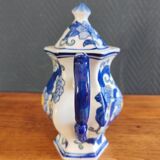Cobalt blue teapot with flower pattern. Hexagonal teapot