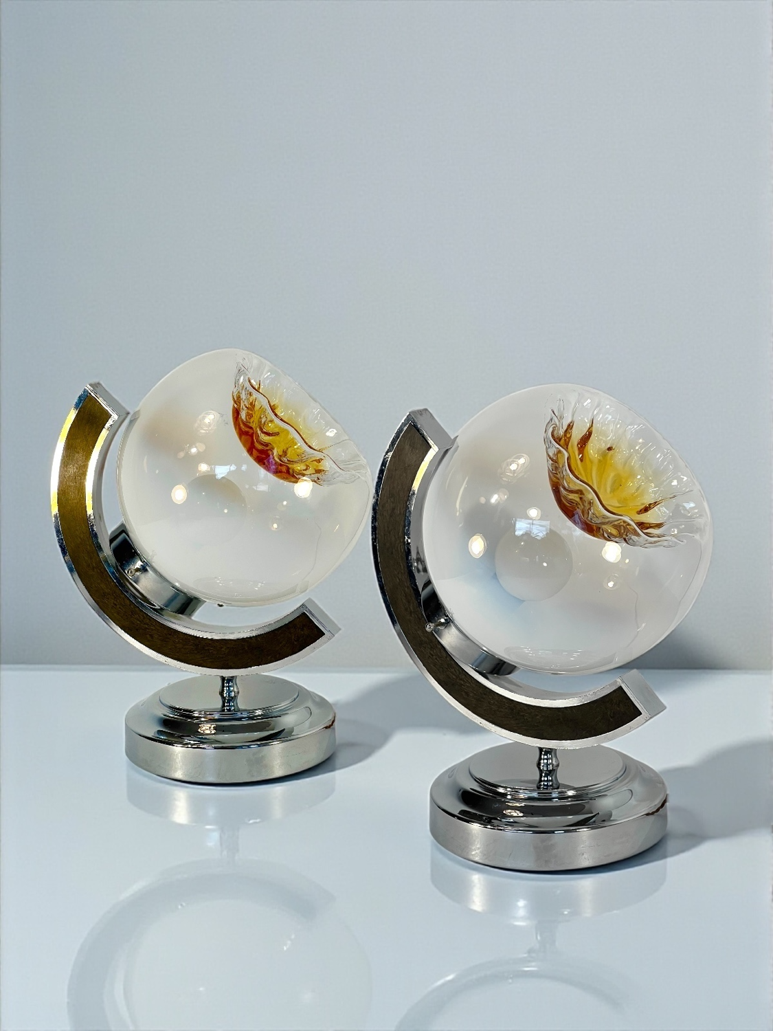 Pair of table lamps with large Murano globes from the 1970s.