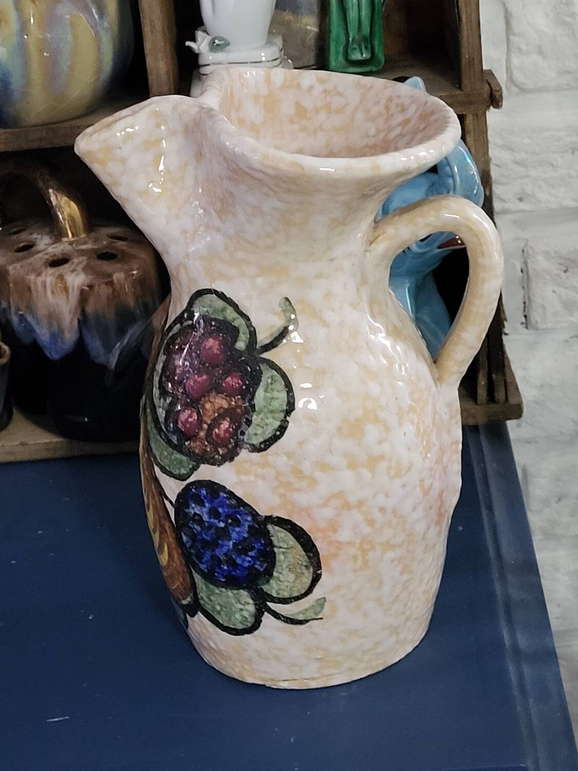 Pitcher decorated with fruit