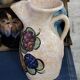Pitcher decorated with fruit
