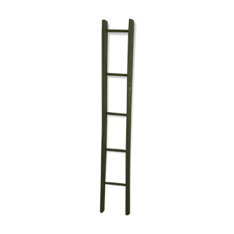 Former small vintage green ladder
