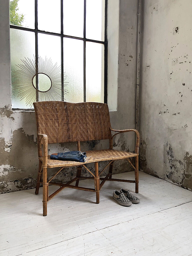 Old wicker and rattan bench