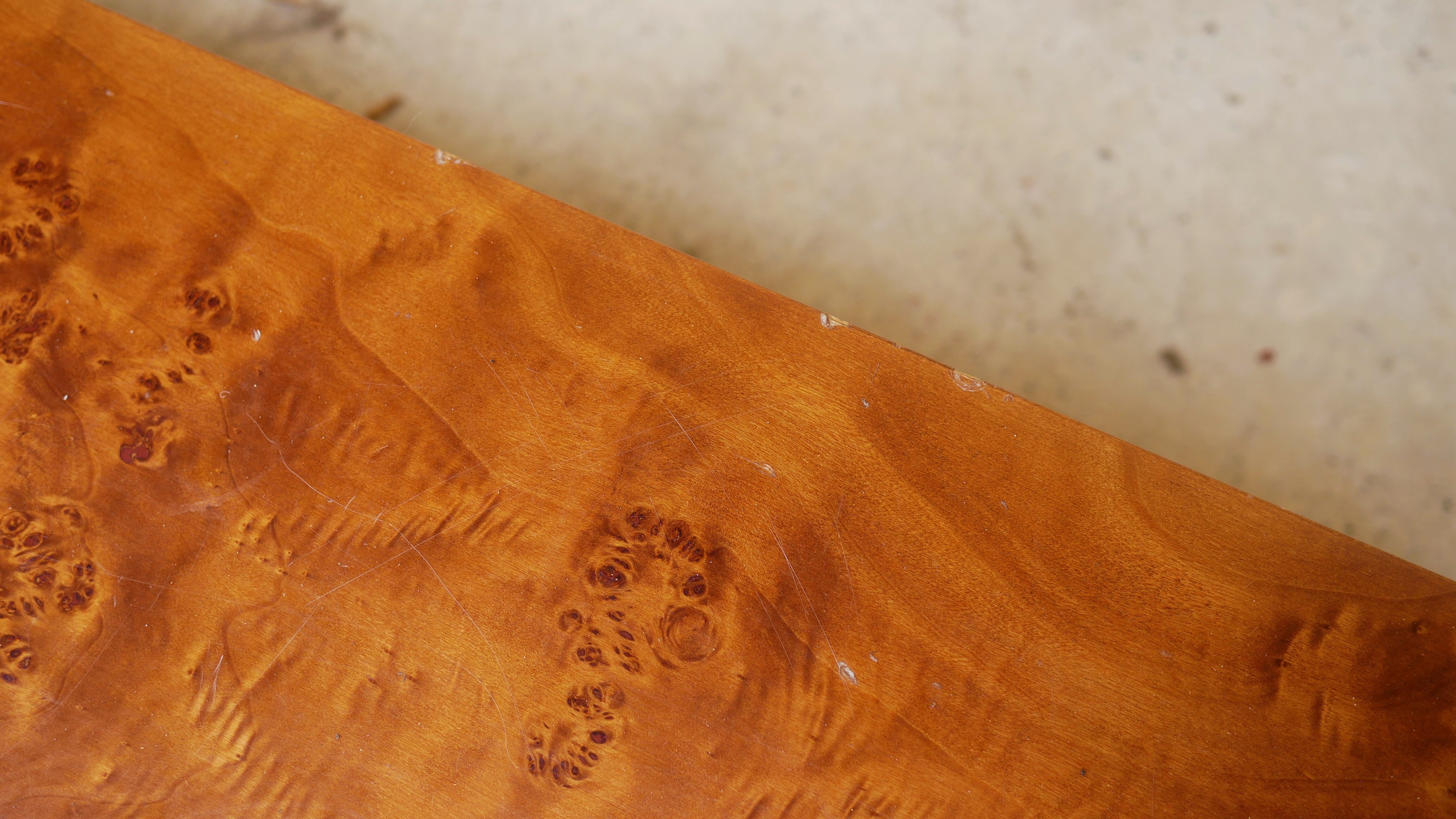 Vintage coffee table in elm magnifying glass