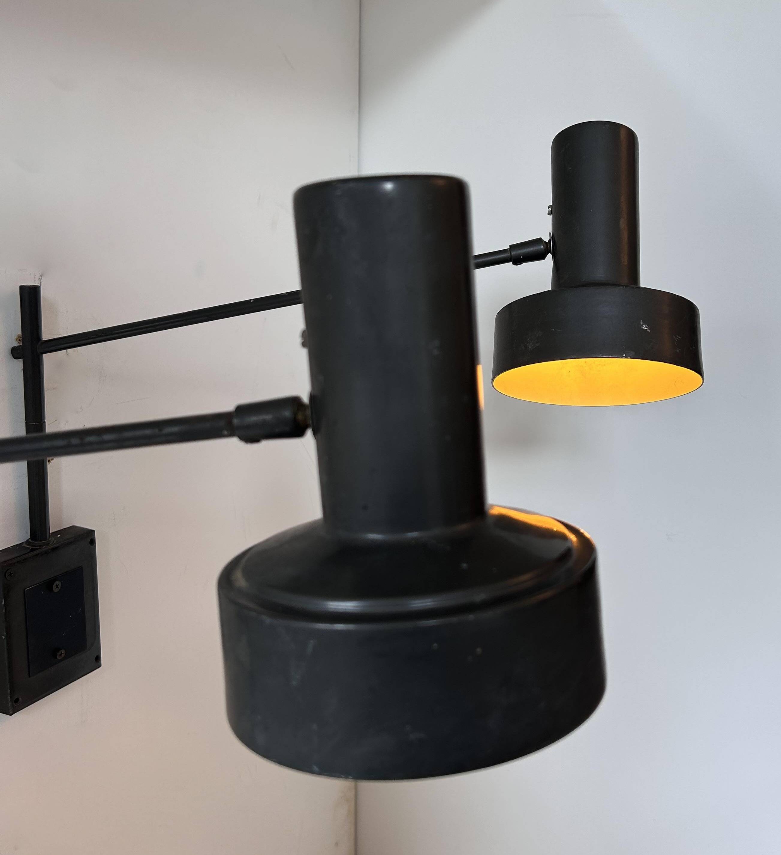 Pair of vintage adjustable wall lights, matte black metal, France 1960s