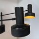 Pair of vintage adjustable wall lights, matte black metal, France 1960s